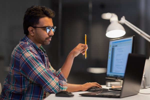 guy sitting in front of computer